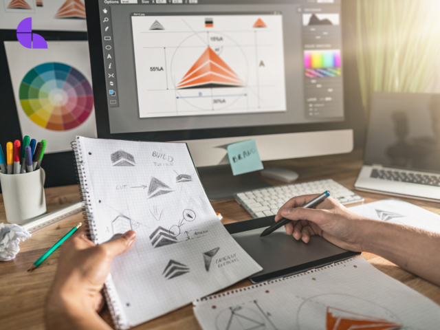 A graphic designer designing a logo for a business.