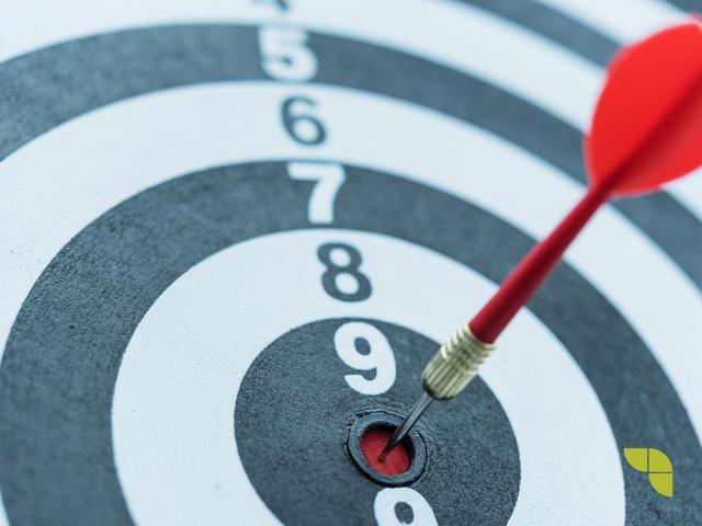 Dart target arrow hitting on bullseye