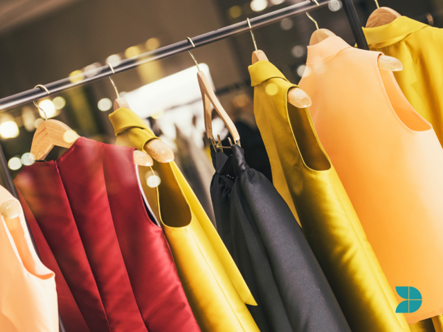 fashion design pieces in a clothes rack.